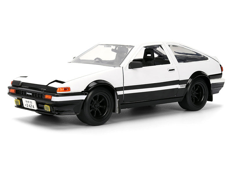 Model car of a white sports car with black stripes on a white background