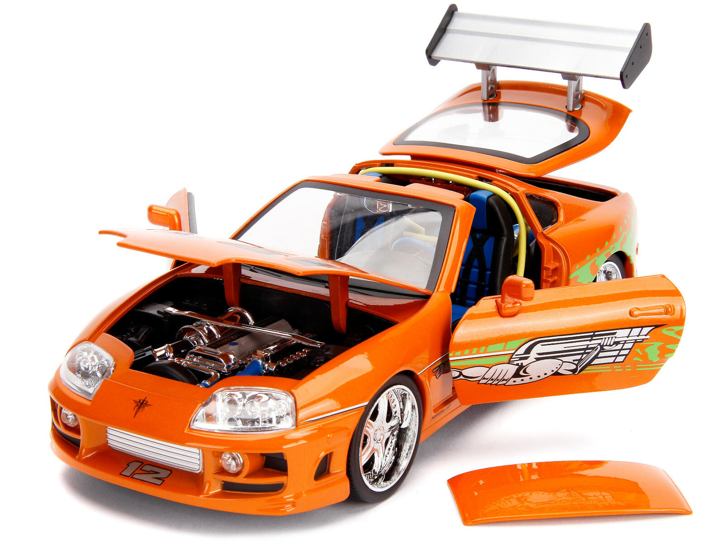 Orange toy car with open doors and hood on a white background