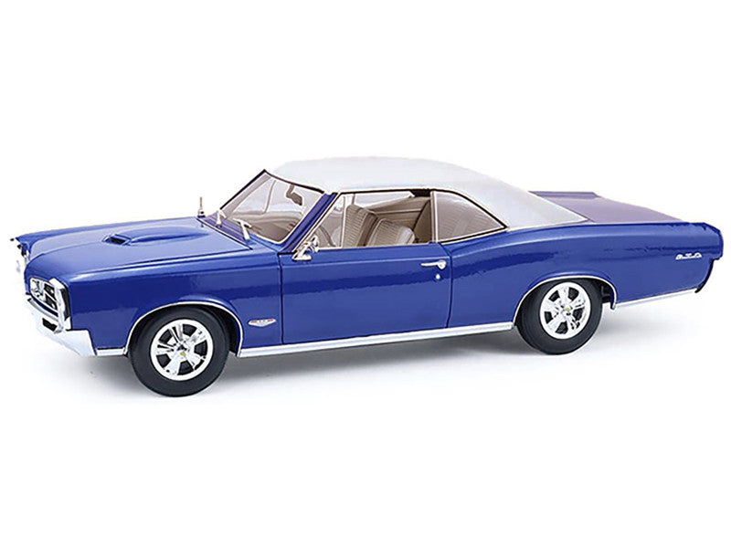 Blue classic car model on a white background