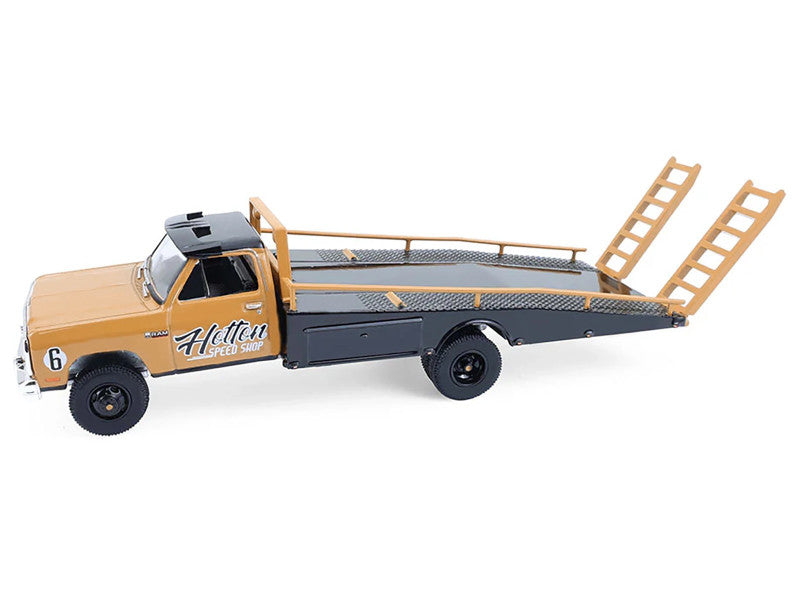 Model of a flatbed truck with a ladder on a white background