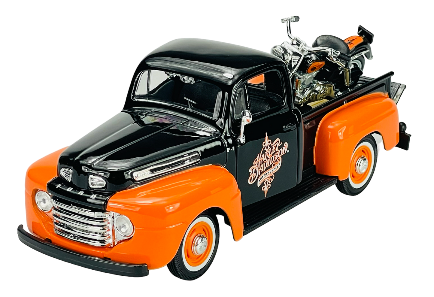 Model truck with black hood and orange body on white background