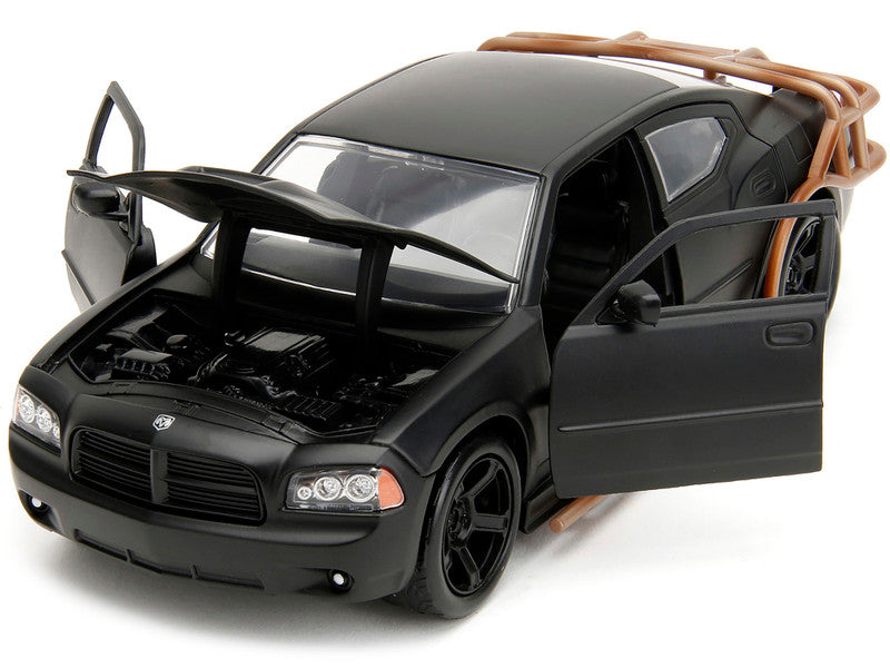 Black model car with open doors and hood on a white background