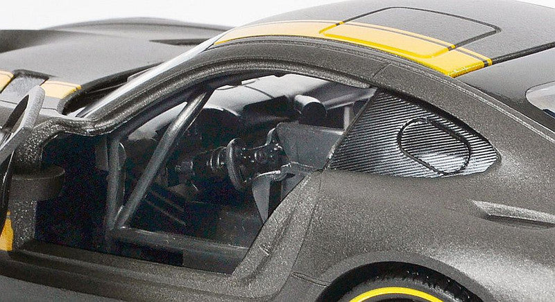 Close-up of a car model with detailed interior and exterior features.
