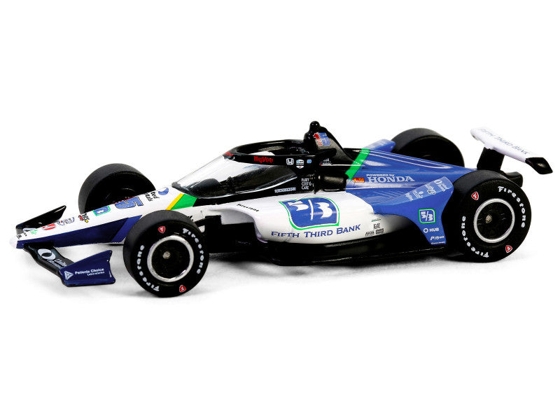 Model race car with various sponsor logos on a white background