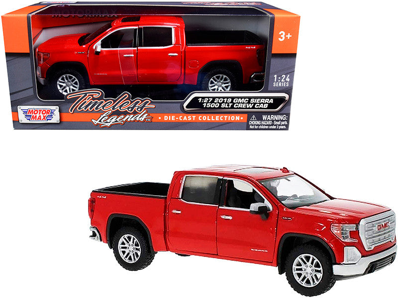 Red toy GMC Sierra truck in packaging with 'Motor Max' branding.