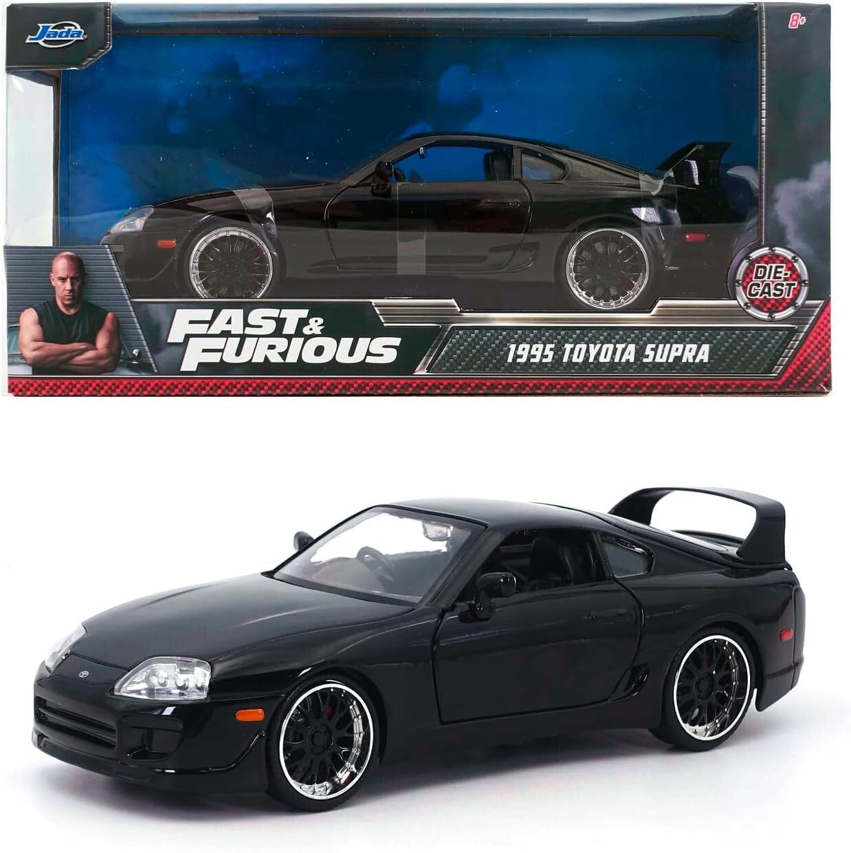 1995 Toyota Supra model car from Fast & Furious series in front of packaging