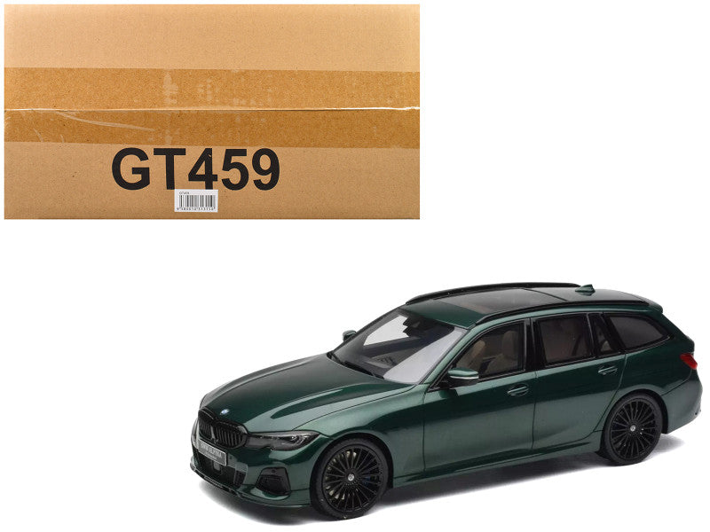 Green car model with 'GT459' on a cardboard box