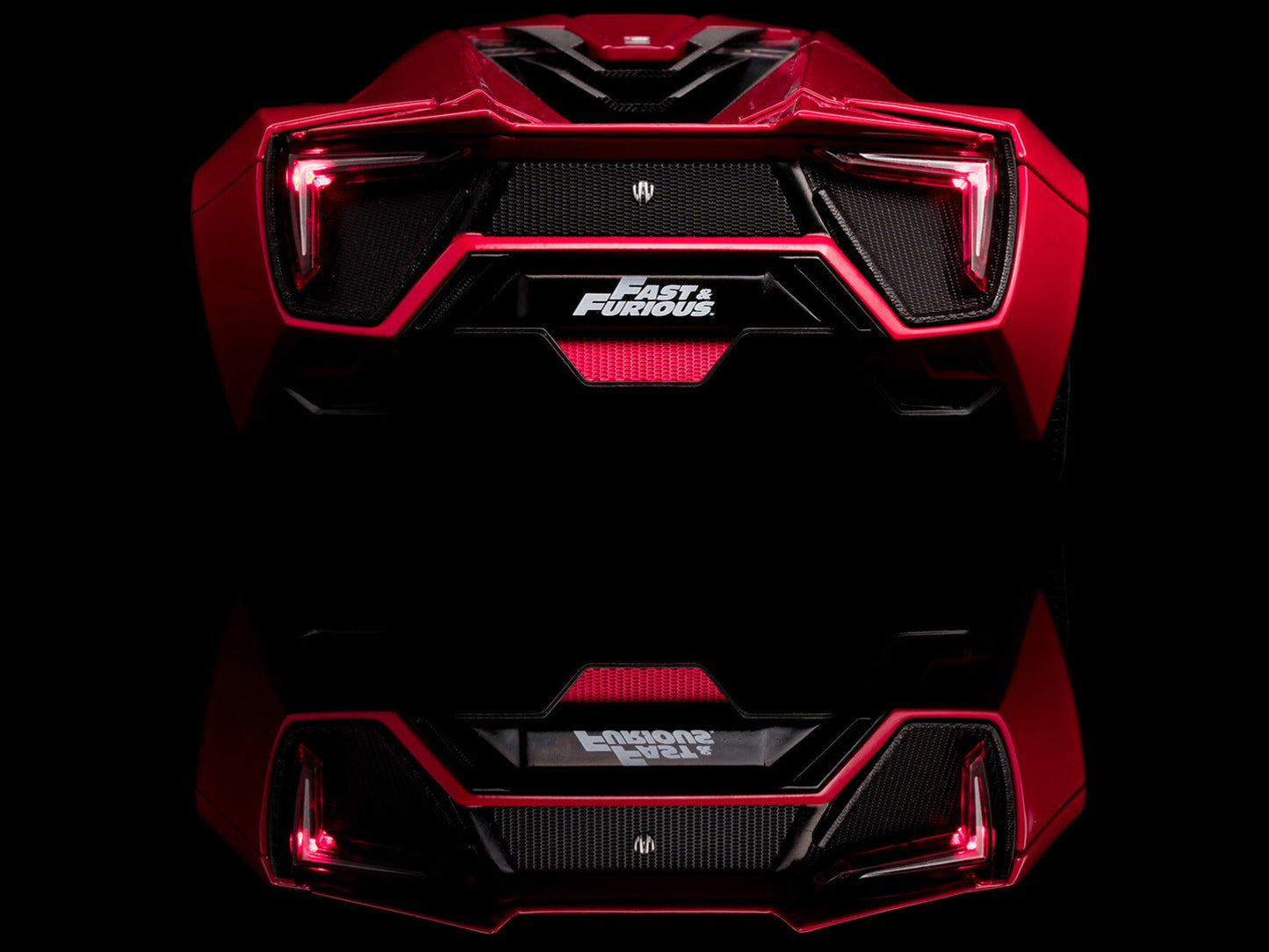 Red and black car model with 'Fast & Furious' branding on a black background