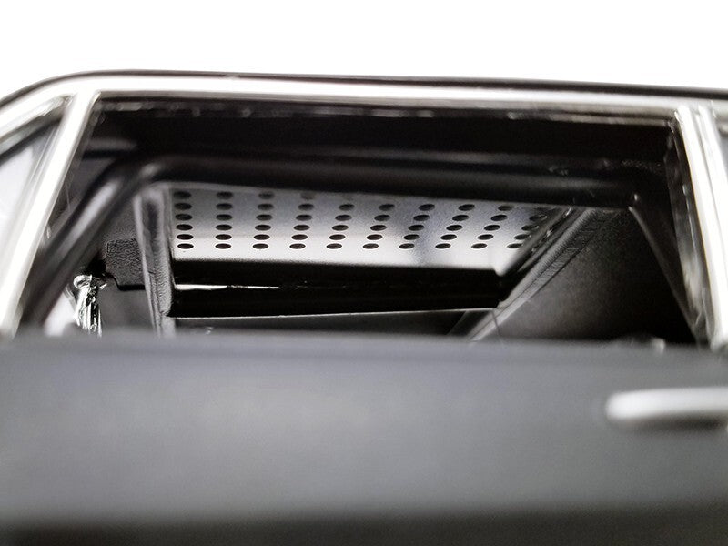 Close-up of a car's air vent with a white background