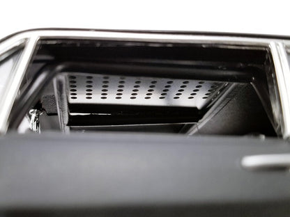 Close-up of a car's air vent with a white background