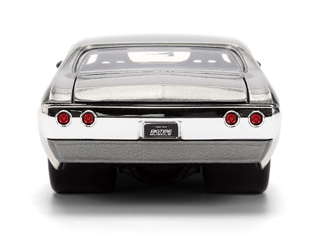 Model car with chrome bumper and red taillights on a white background