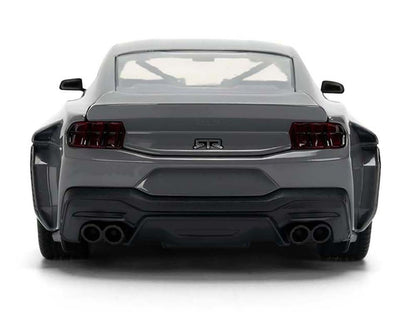 Back view of a gray sports car on a white background