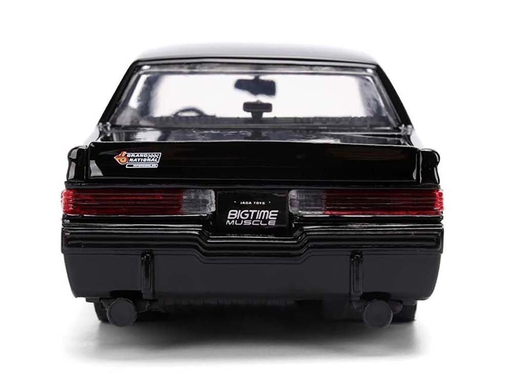 Black model car with 'Bigtime Muscle' branding on a white background