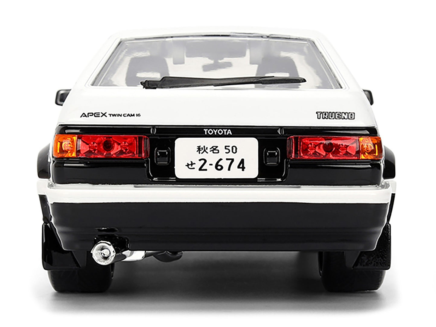 Back view of a Toyota car with visible branding on a white background