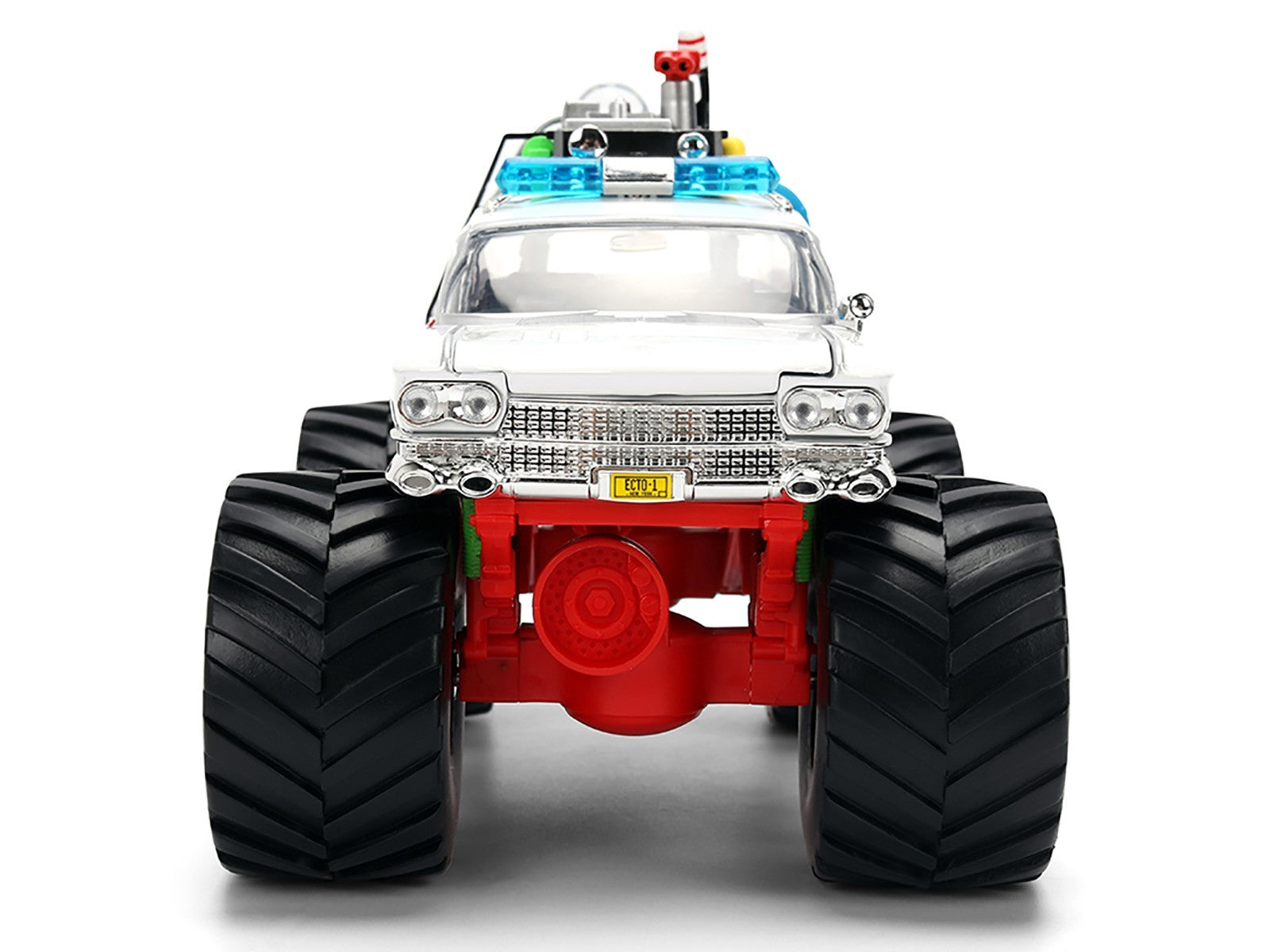 Toy monster truck with large wheels and colorful lights on a white background