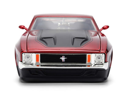 Red classic car with a prominent grille on a white background