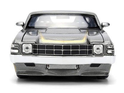 Front view of a silver classic car model on a white background