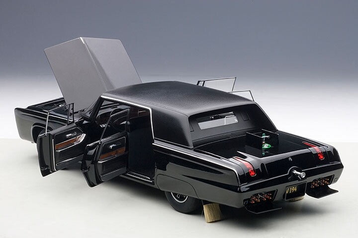 doors open and hood open on black model car
