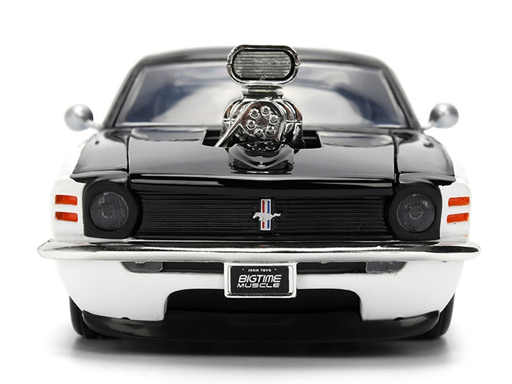 Model car with chrome accents on a white background