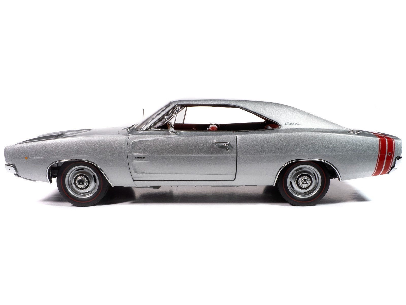 Side view of a classic silver muscle car with red stripes on a white background