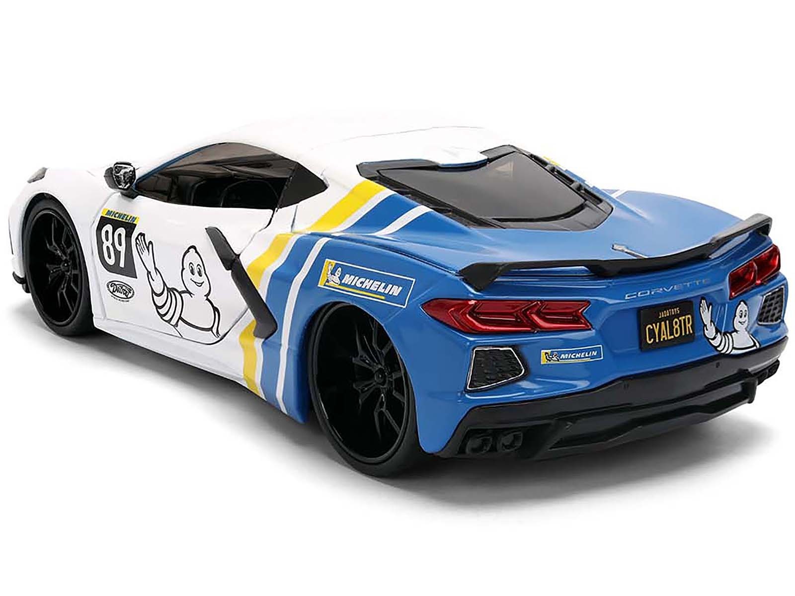 Model car with racing livery on a white background