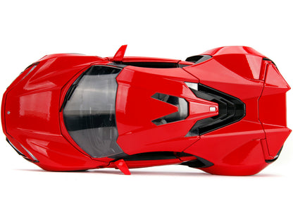 Red toy car with black accents on a white background