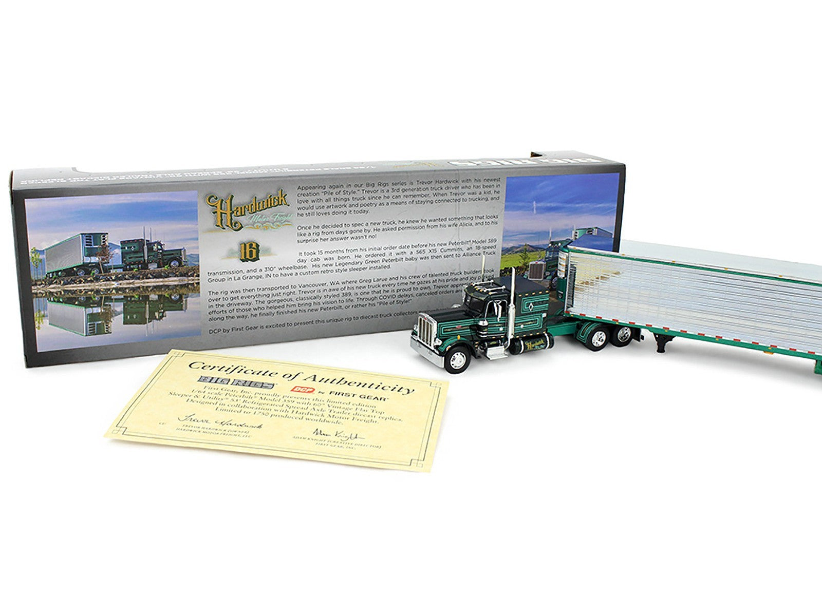 Model truck with packaging and certificate of authenticity on a white background