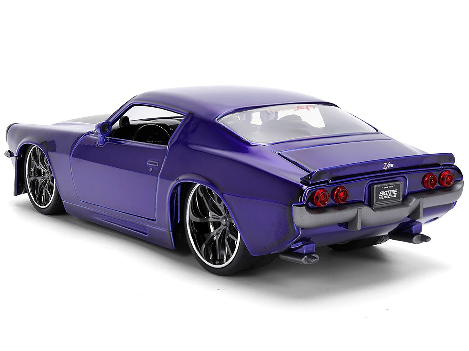 Purple sports car on a white background