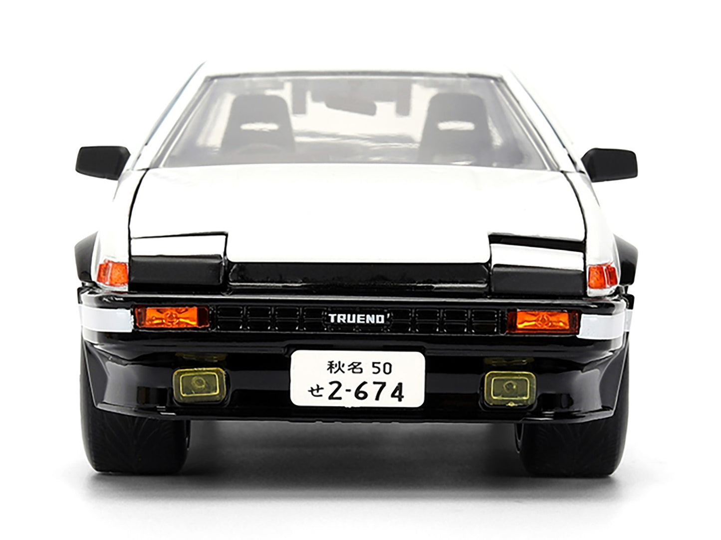 Front view of a black and white car with 'TRUENO' branding on a white background