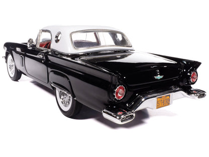 Black classic car model on a white background