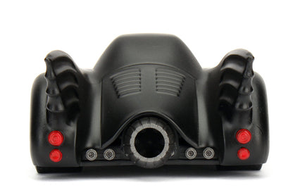 Black motorcycle engine cover with red lights on a white background