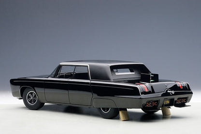 side angle view and back end of a black toy diecast model car