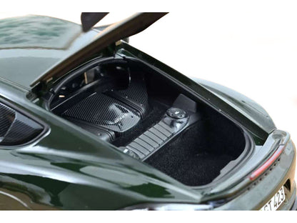 Open car hood with a focus on the engine compartment.