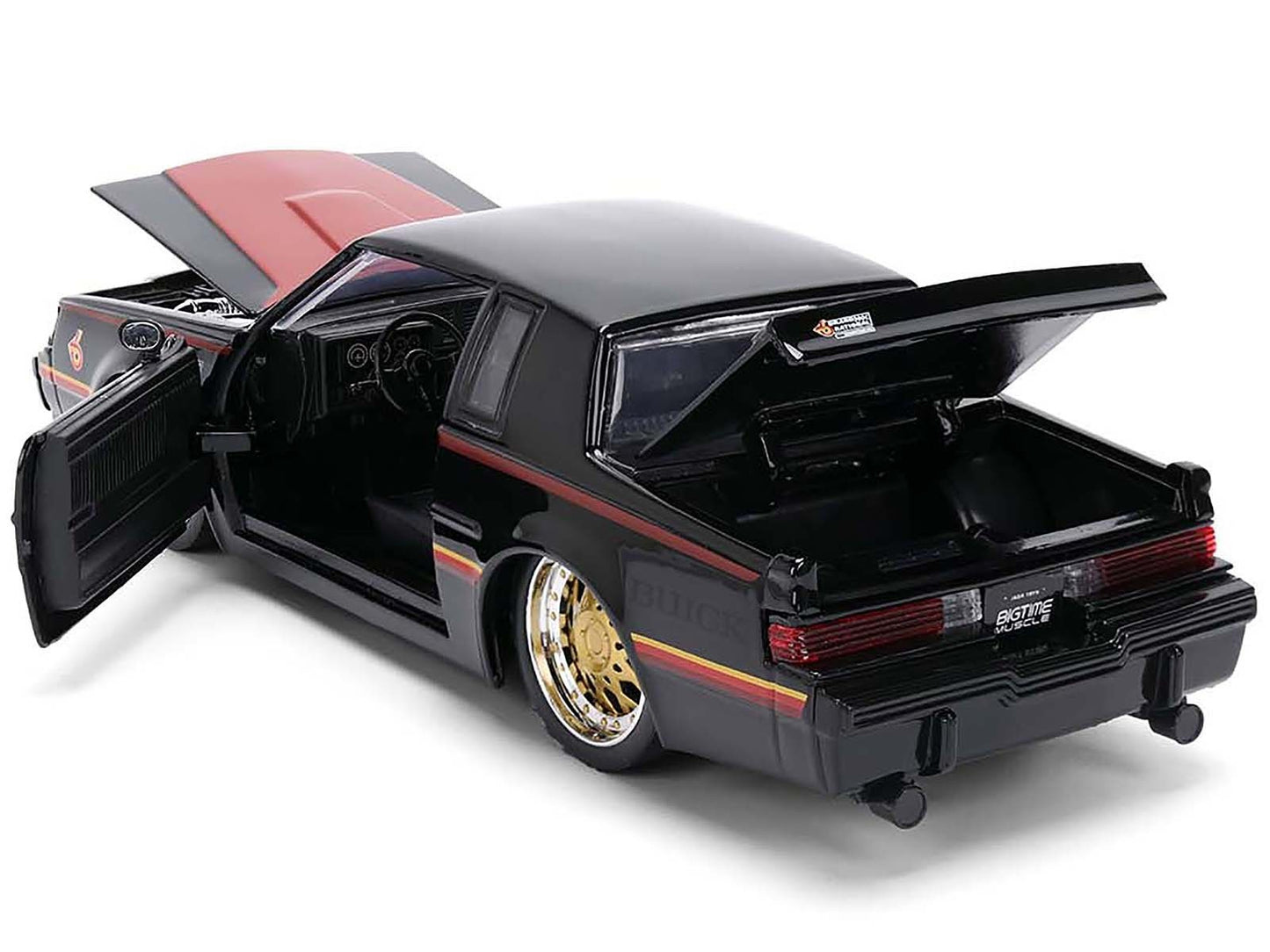 Black model car with open doors and trunk on a white background
