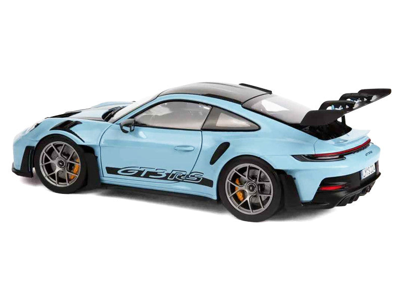 Light blue model car with 'GT3 RS' branding on a white background