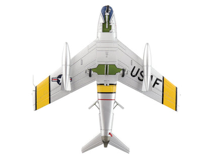 Model airplane with US Air Force markings on a white background