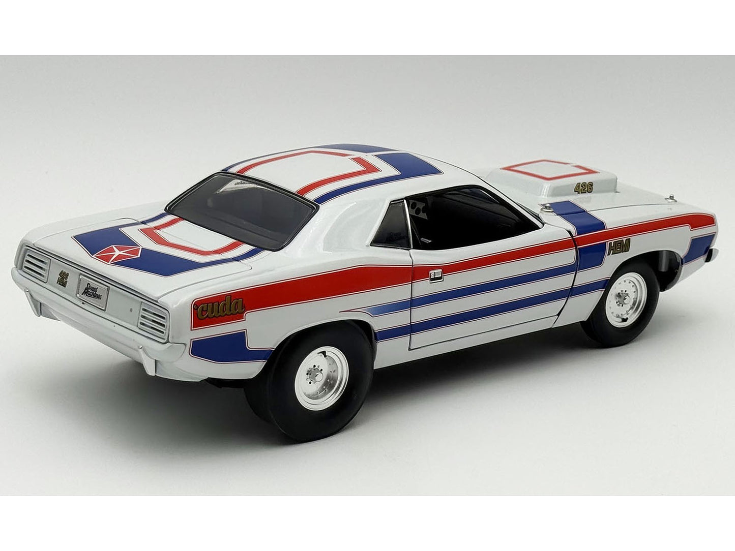 Model car with red, white, and blue stripes on a white background