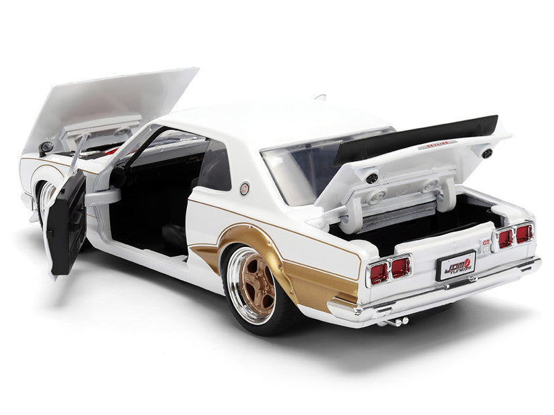 Model car with open doors and trunk on a white background