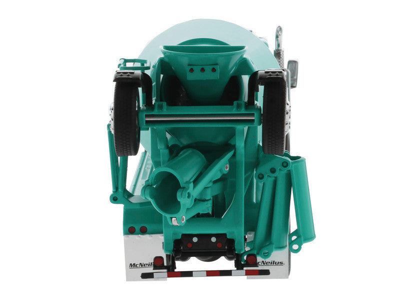 Teal industrial machine component on a white background