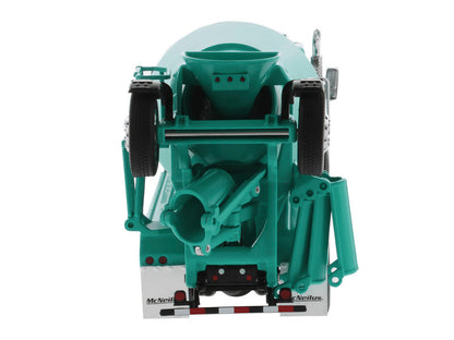 Teal industrial machine component on a white background