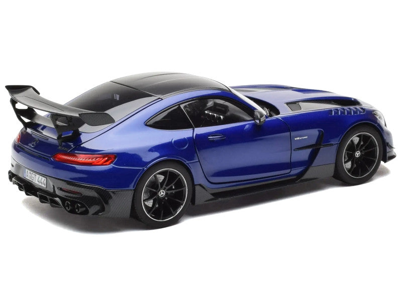 Blue sports car model on a white background