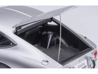 Open trunk of a silver Toyota car with visible interior and branding.