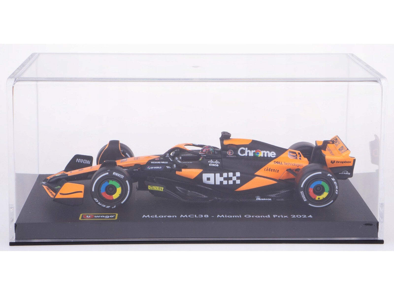 Model of a McLaren F1 car in a clear display case