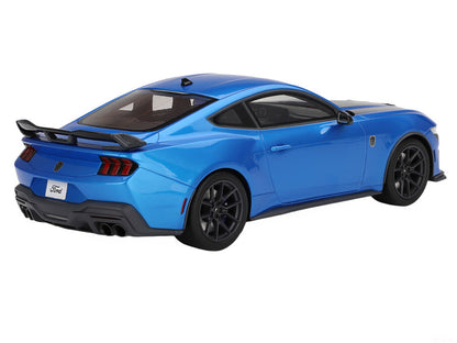 Blue Ford Mustang sports car on a white background