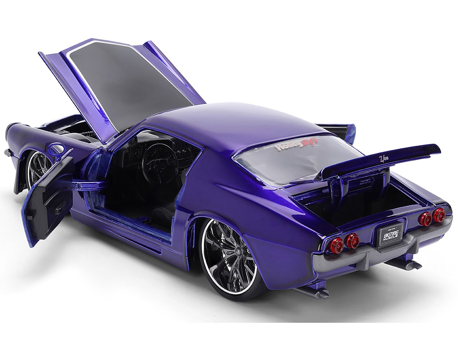 Purple model car with open doors on a white background