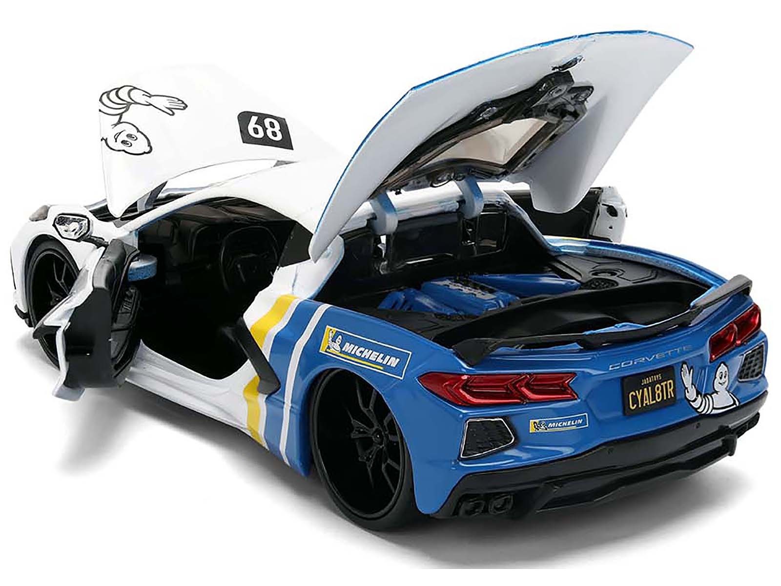 Model car with open hood on a white background