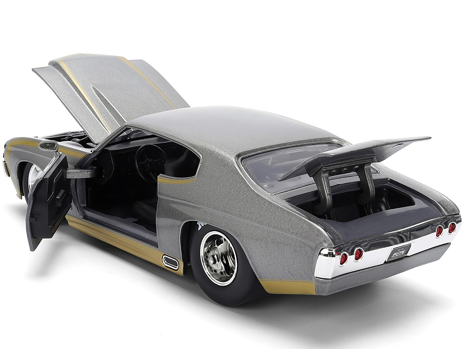 Model car with open doors and trunk on a white background