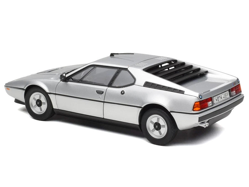 Silver sports car model on a white background