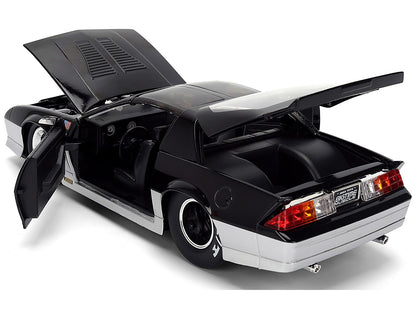 Black sports car with open doors on a white background