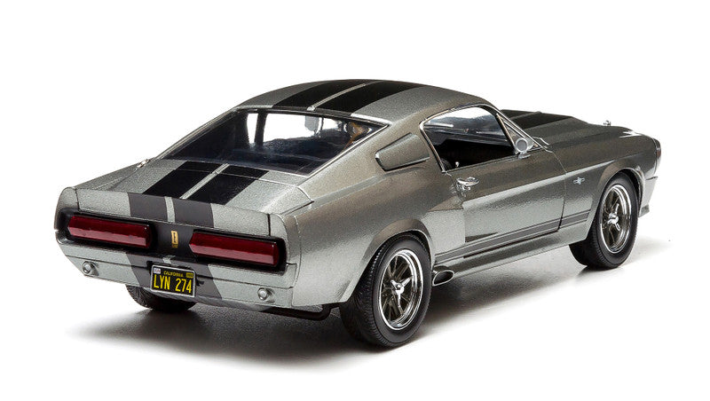 Model of a classic car with a white background